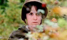 Anne Elliot watching through the hedgerows.