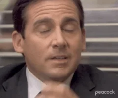 The Office facepal GIF - Michael Scott pinches the bridge of his nose in exasperation.